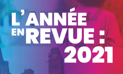 Image colorée du titre, qui dit "l'année en revue : 2021"
